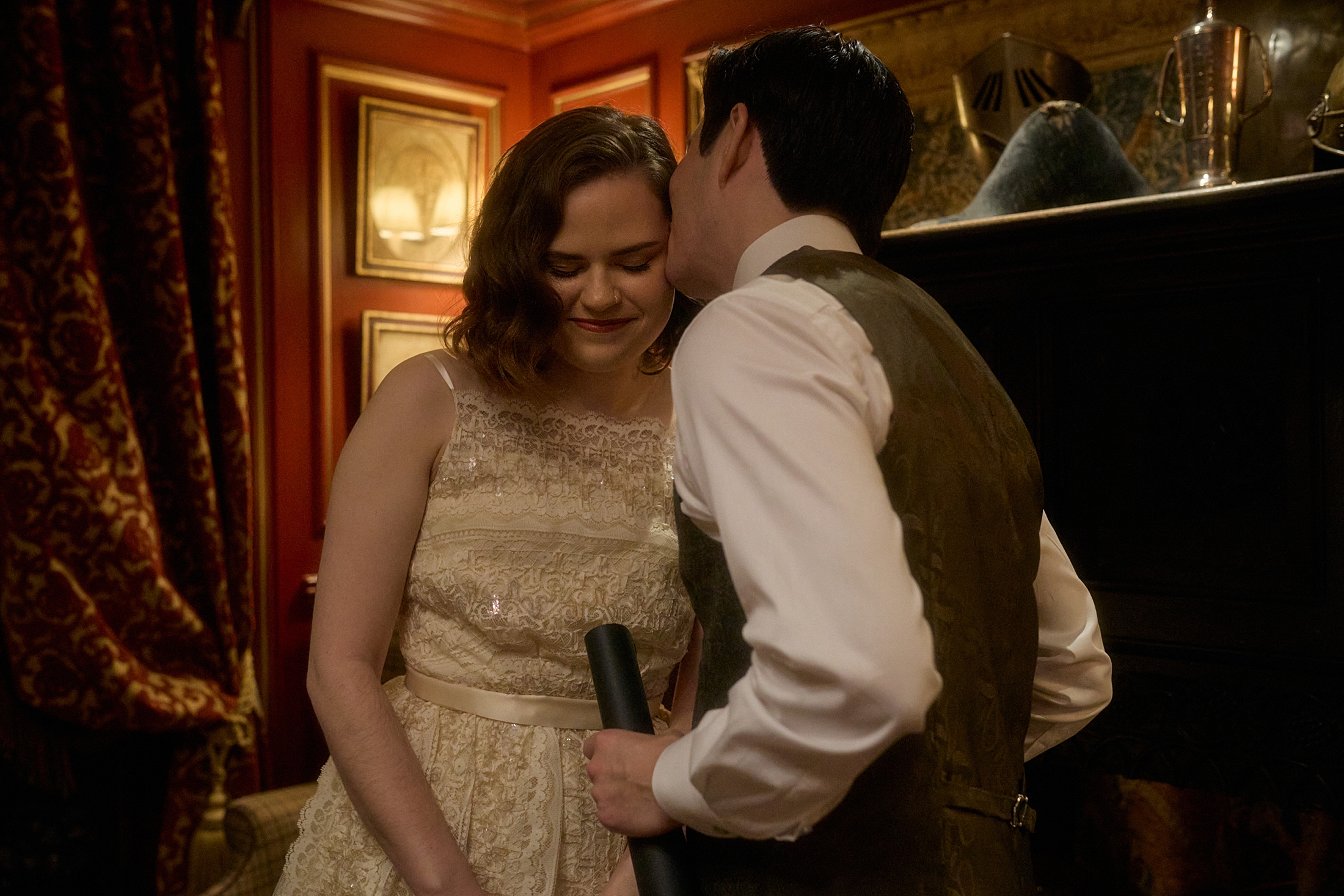 Couple sharing a quiet moment at The Witchery in Edinburgh before their ceremony