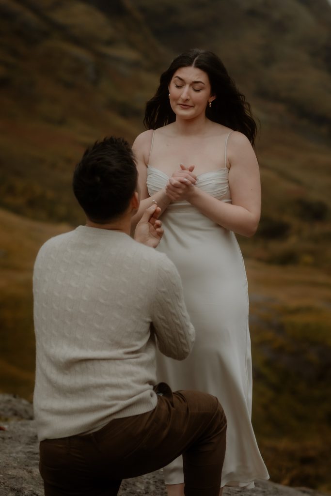 Emotional reaction during a surprise proposal in Glencoe, Scotland