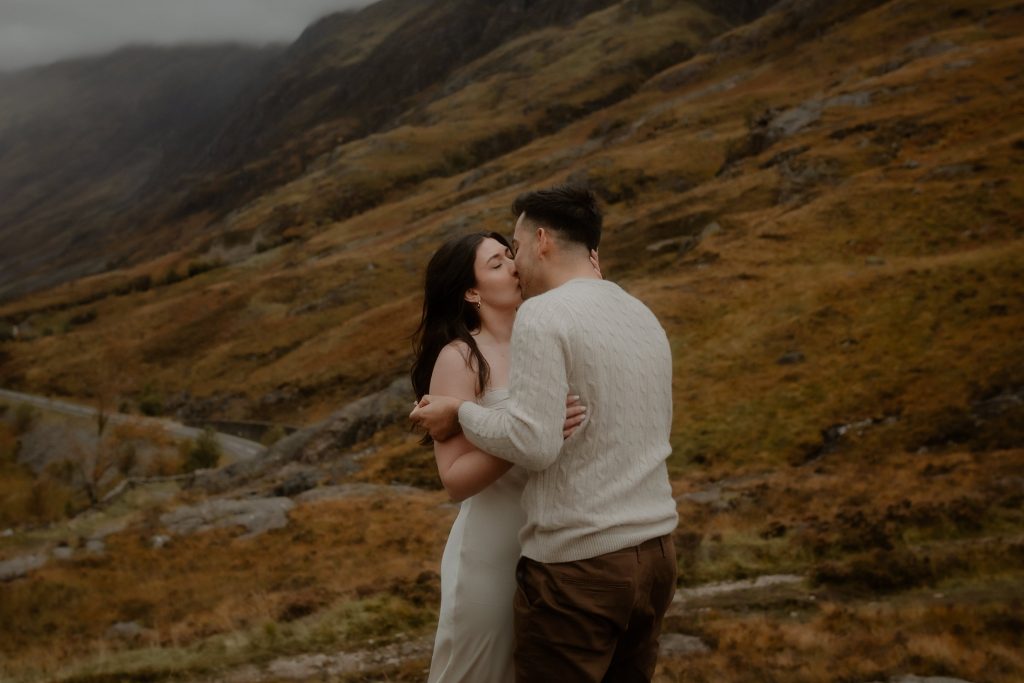 Intimate moment after a Glencoe surprise proposal