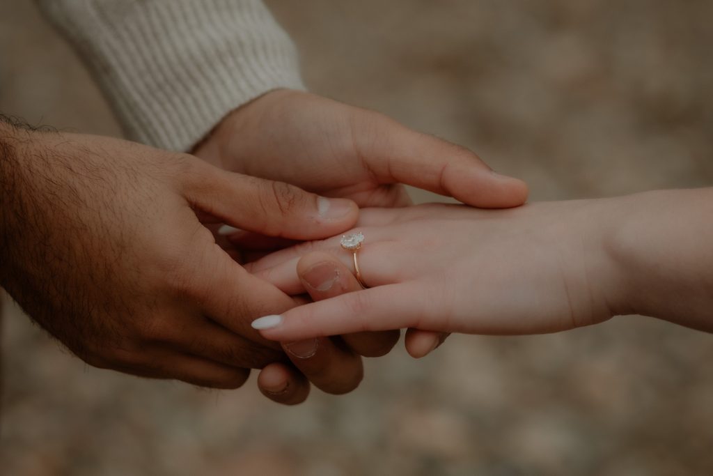 Close-up of engagement ring during proposal in Scotland